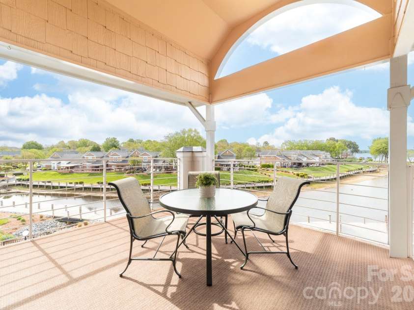 18633 Harborside Drive, Cornelius, NC 28031.  MLS# CAR4366033, YatesRealty ID 17653. Sweeping water views
