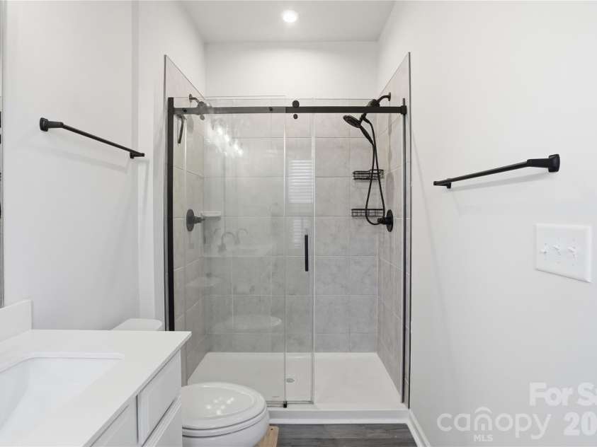 1311 Ashbury Street, Charlotte, NC 28216.  MLS# CAR4370240, YatesRealty ID 17660. Dual Shower Heads - Upgraded Barn Shower Door