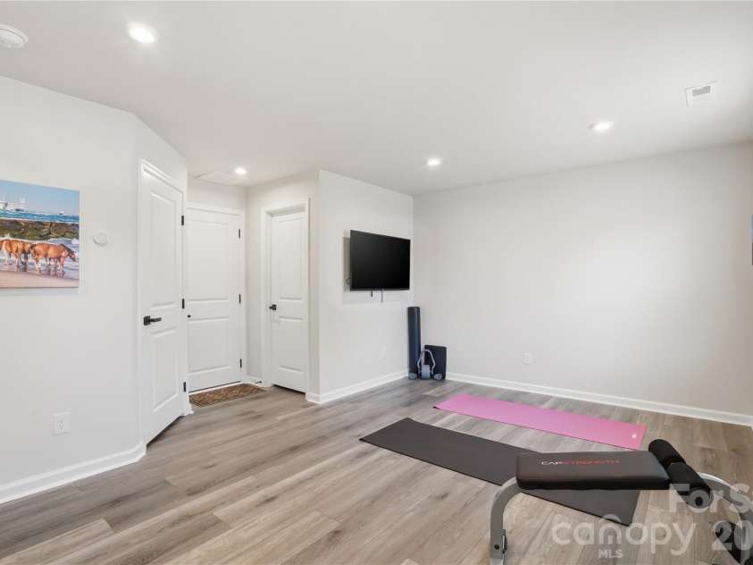 1311 Ashbury Street, Charlotte, NC 28216.  MLS# CAR4370240, YatesRealty ID 17660. Entry - Flex Space - Two walk-in closets, coat closet and garage access
