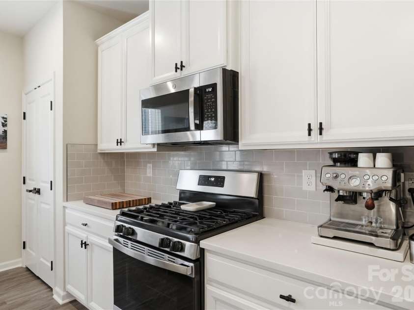 1311 Ashbury Street, Charlotte, NC 28216.  MLS# CAR4370240, YatesRealty ID 17660. Gas Range - Pantry Closet