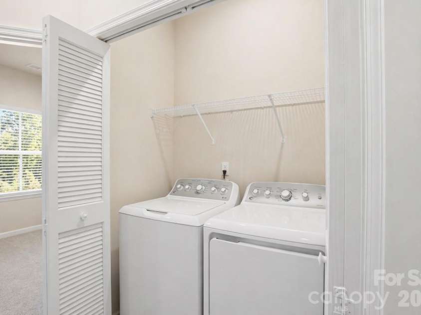 1311 Ashbury Street, Charlotte, NC 28216.  MLS# CAR4370240, YatesRealty ID 17660. Laundry Closet - Third Level - Washer/Dryer Convey