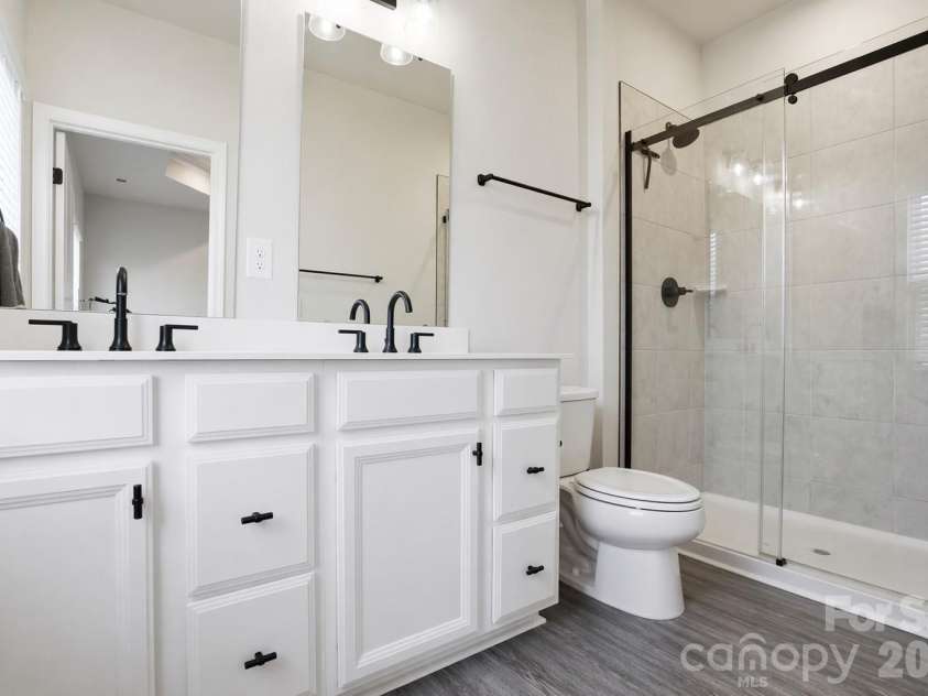 1311 Ashbury Street, Charlotte, NC 28216.  MLS# CAR4370240, YatesRealty ID 17660. Primary Bathroom - Dual Sinks, LVP Flooring