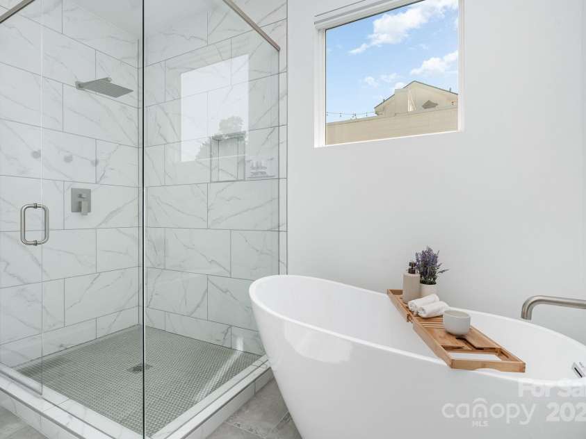 302 Wesley Heights Way, Charlotte, NC 28208.  MLS# CAR4249828, YatesRealty ID 17664. Spa like primary bathroom