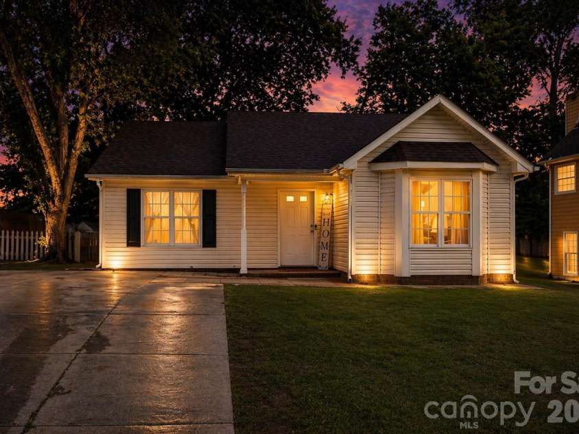 7442 Crestside Lane, Charlotte, NC 28227.  MLS# CAR4373229, YatesRealty ID 17666. Twilight (Ai) front view