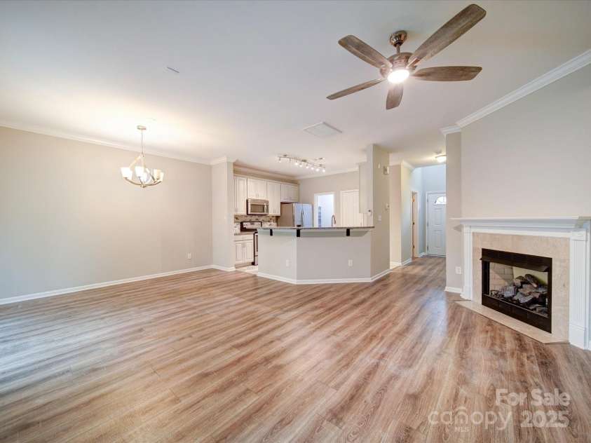 12231 Stratfield Place Circle, Pineville, NC 28134.  MLS# CAR4261206, YatesRealty ID 17667. Fire Place In Living Room