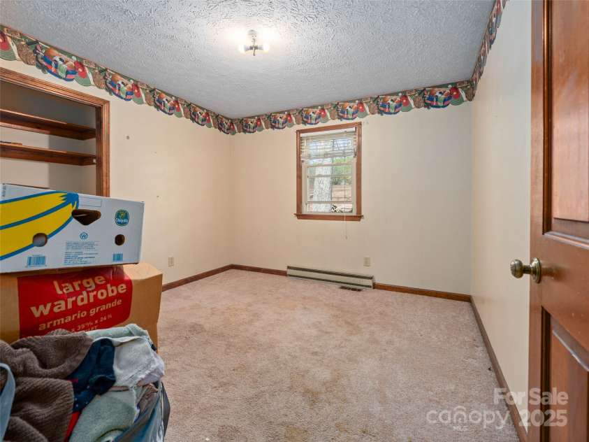 23 Keeneland Drive, Hendersonville, NC 28792.  MLS# CAR4235289, YatesRealty ID 17668. 