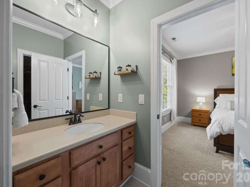 107 Spears Creek Drive, Mooresville, NC 28117.  MLS# CAR4371650, YatesRealty ID 17669. Jack & jill bath has separated sink areas