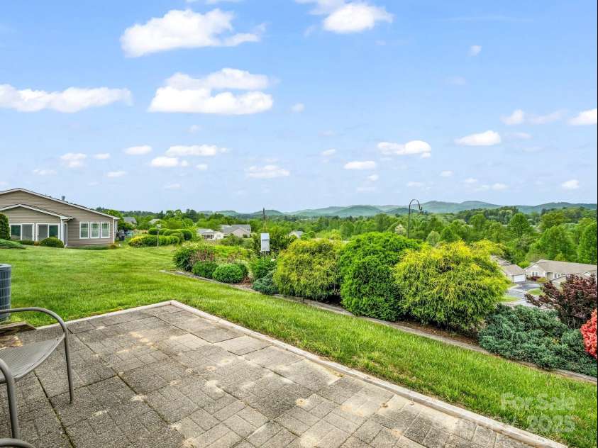 5802 Wood Duck Way, Hendersonville, NC 28792.  MLS# CAR4251219, YatesRealty ID 17674. Back Patio