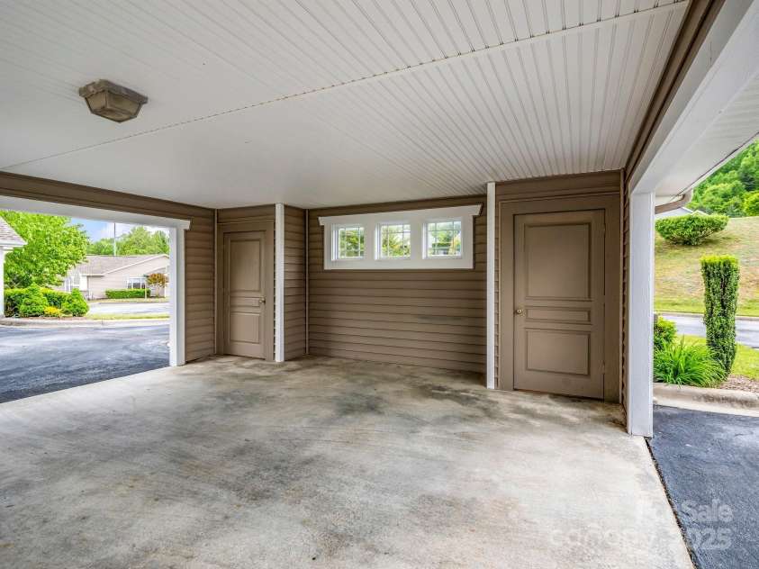 5802 Wood Duck Way, Hendersonville, NC 28792.  MLS# CAR4251219, YatesRealty ID 17674. Carport w/Double Storage Closets and Drop Down Attic
