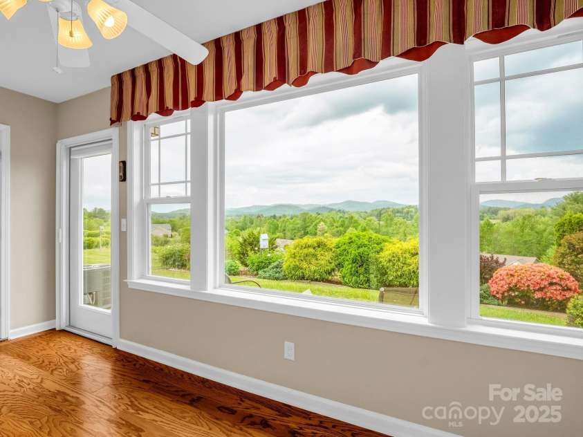 5802 Wood Duck Way, Hendersonville, NC 28792.  MLS# CAR4251219, YatesRealty ID 17674. Sunroom