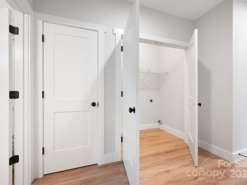 20 Tahkieostie Trail, Asheville, NC 28806.  MLS# CAR4221913, YatesRealty ID 17675. Laundry room on lower level