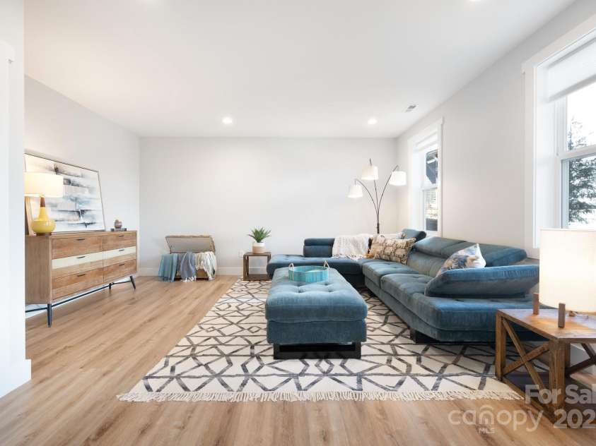 20 Tahkieostie Trail, Asheville, NC 28806.  MLS# CAR4221913, YatesRealty ID 17675. Lower-level family room flex space