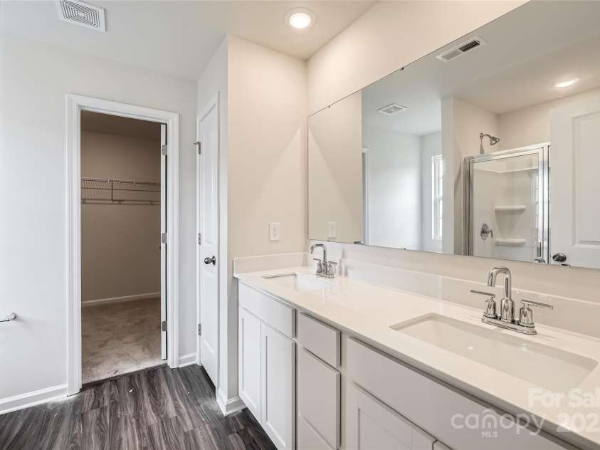 146 Astor Street, Troutman, NC 28166.  MLS# CAR4267188, YatesRealty ID 17678. Owner's Bath