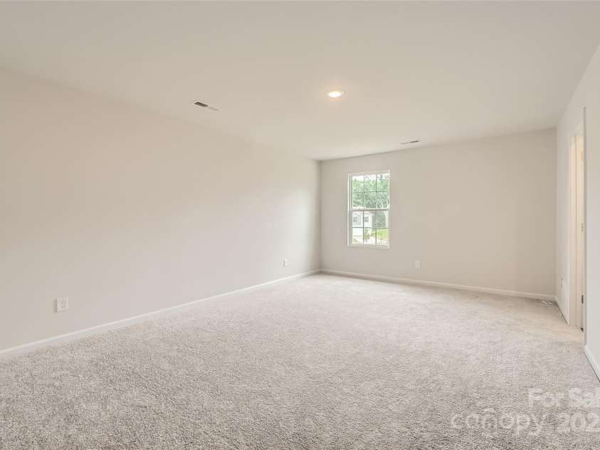 146 Astor Street, Troutman, NC 28166.  MLS# CAR4267188, YatesRealty ID 17678. Owner's Suite