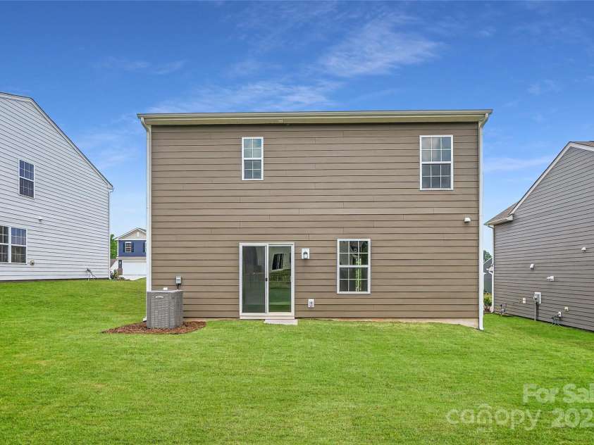 146 Astor Street, Troutman, NC 28166.  MLS# CAR4267188, YatesRealty ID 17678. Rear Exterior