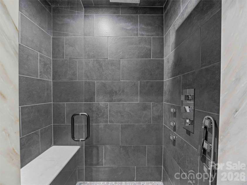 945 Roaring Fork Road, Hot Springs, NC 28743.  MLS# CAR4307267, YatesRealty ID 17678. Primary shower