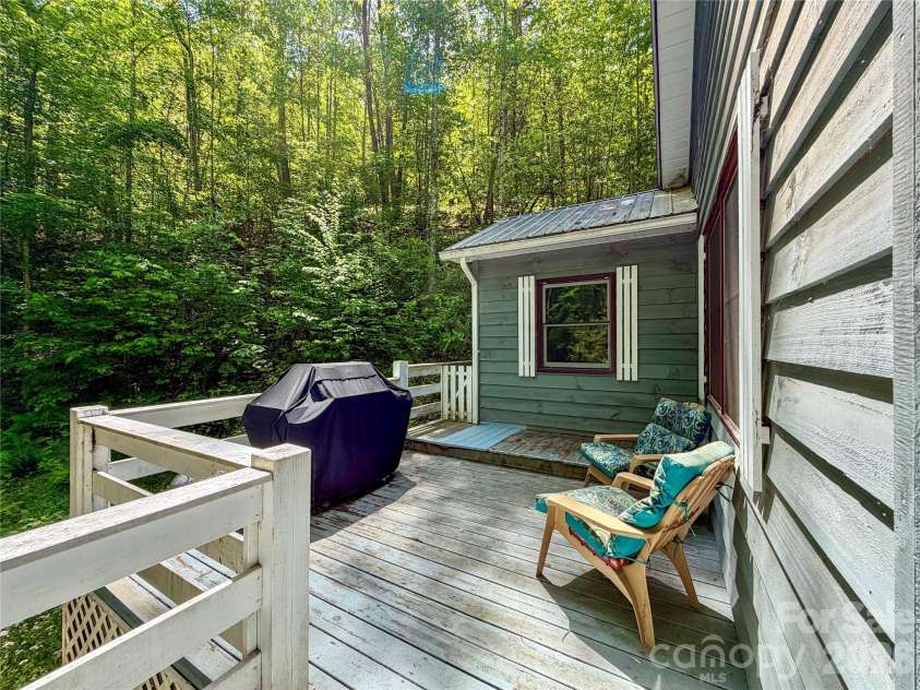 175 Cougar Lane, Whittier, NC 28789.  MLS# CAR4375470, YatesRealty ID 17686. Side Deck