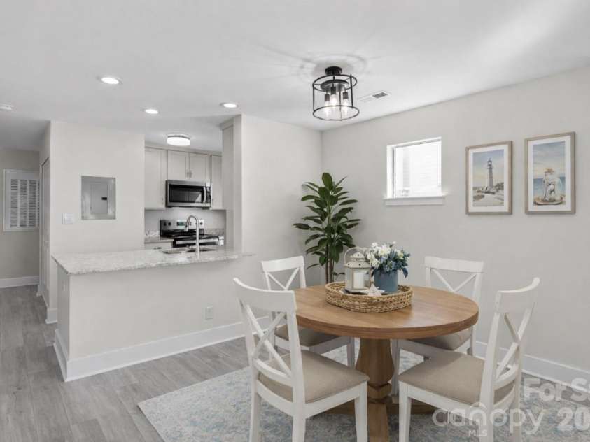 18729 Vineyard Point Lane, Cornelius, NC 28031.  MLS# CAR4344538, YatesRealty ID 17687. Virtually staged dining room.