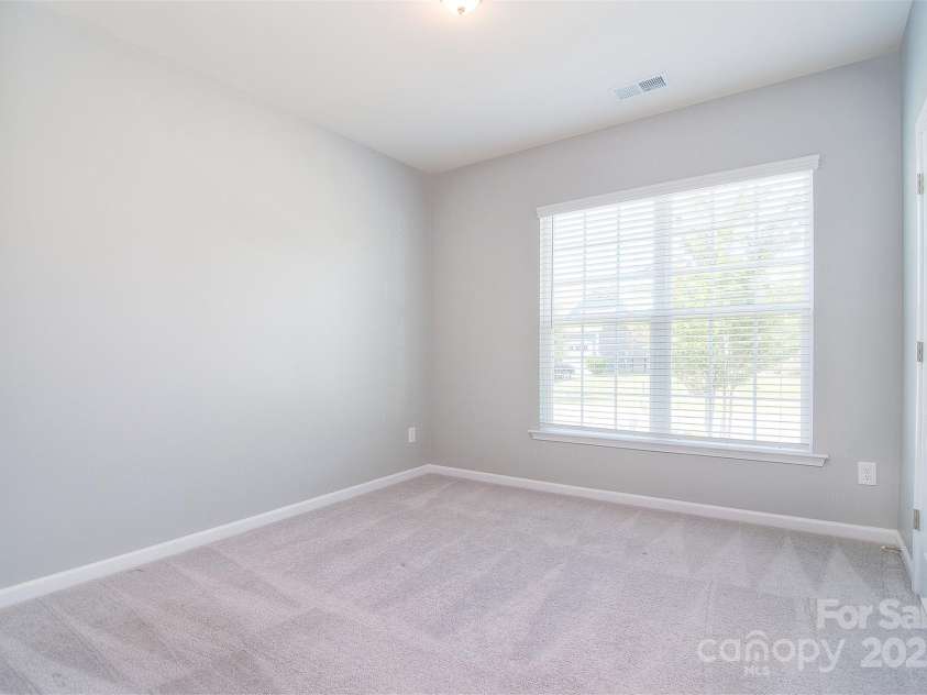 3073 Oliver Stanley Trail, Lancaster, SC 29720.  MLS# CAR4253520, YatesRealty ID 17689. Bedroom 3 on the main level.