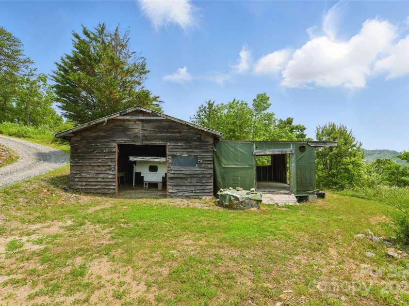 33 Faholoa Ridge Road, Black Mountain, NC 28711.  MLS# CAR4263286, YatesRealty ID 17690. Carport/Barn + Storage Shed