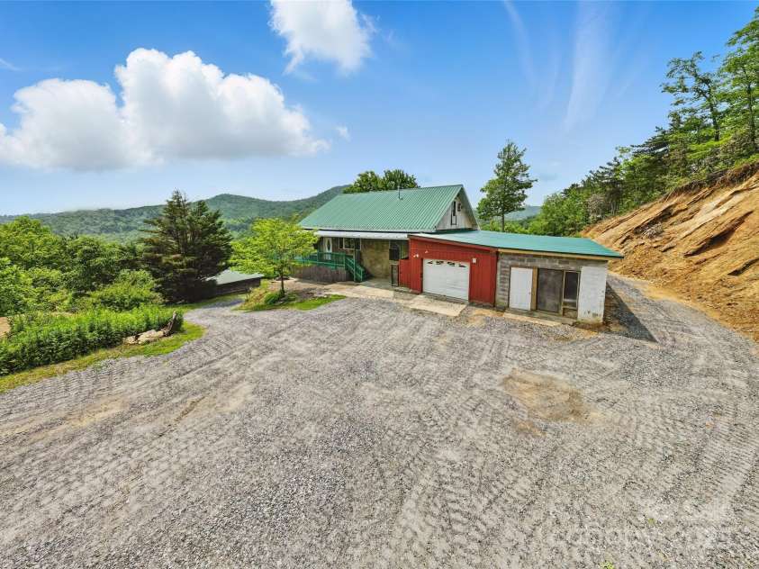 33 Faholoa Ridge Road, Black Mountain, NC 28711.  MLS# CAR4263286, YatesRealty ID 17690. Front of home