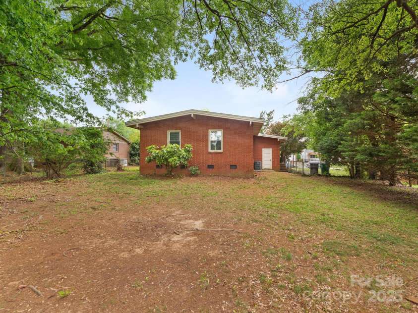 1438 Larkfield Lane, Charlotte, NC 28210.  MLS# CAR4249851, YatesRealty ID 17694. Rear Exterior