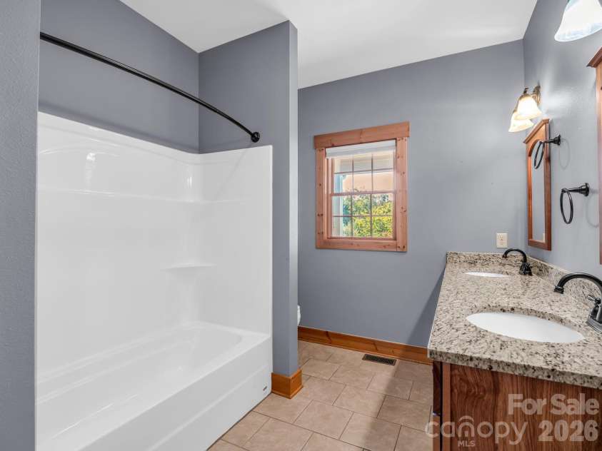 82 Red Mulberry Drive, Zirconia, NC 28790.  MLS# CAR4363684, YatesRealty ID 17694. 2nd full bathroom