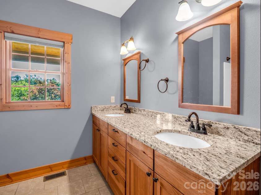 82 Red Mulberry Drive, Zirconia, NC 28790.  MLS# CAR4363684, YatesRealty ID 17694. 2nd full bathroom