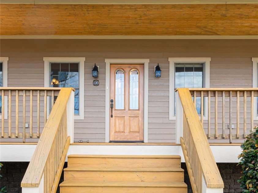 82 Red Mulberry Drive, Zirconia, NC 28790.  MLS# CAR4363684, YatesRealty ID 17694. Front steps to home
