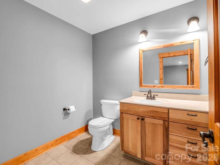 82 Red Mulberry Drive, Zirconia, NC 28790.  MLS# CAR4363684, YatesRealty ID 17694. Half bath on lower level