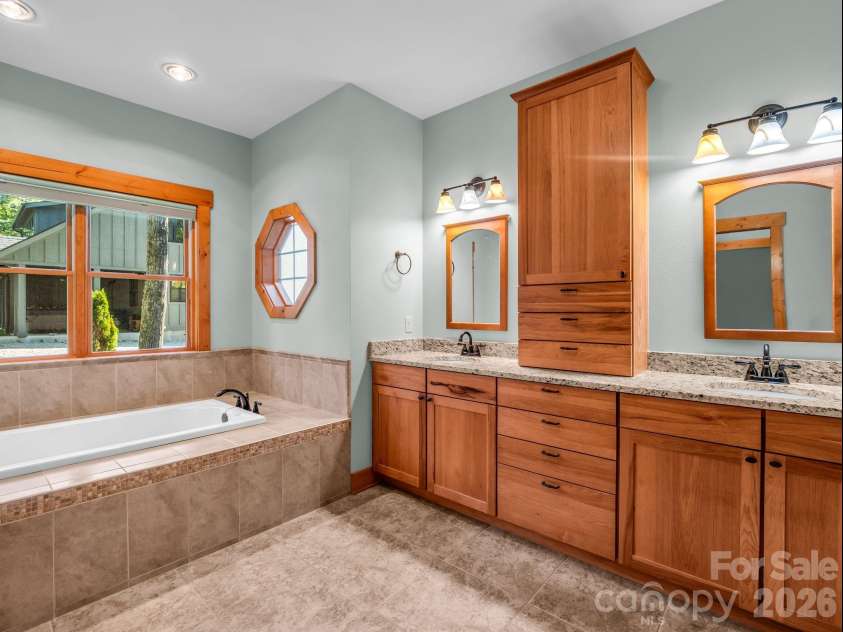 82 Red Mulberry Drive, Zirconia, NC 28790.  MLS# CAR4363684, YatesRealty ID 17694. Primary bathroom