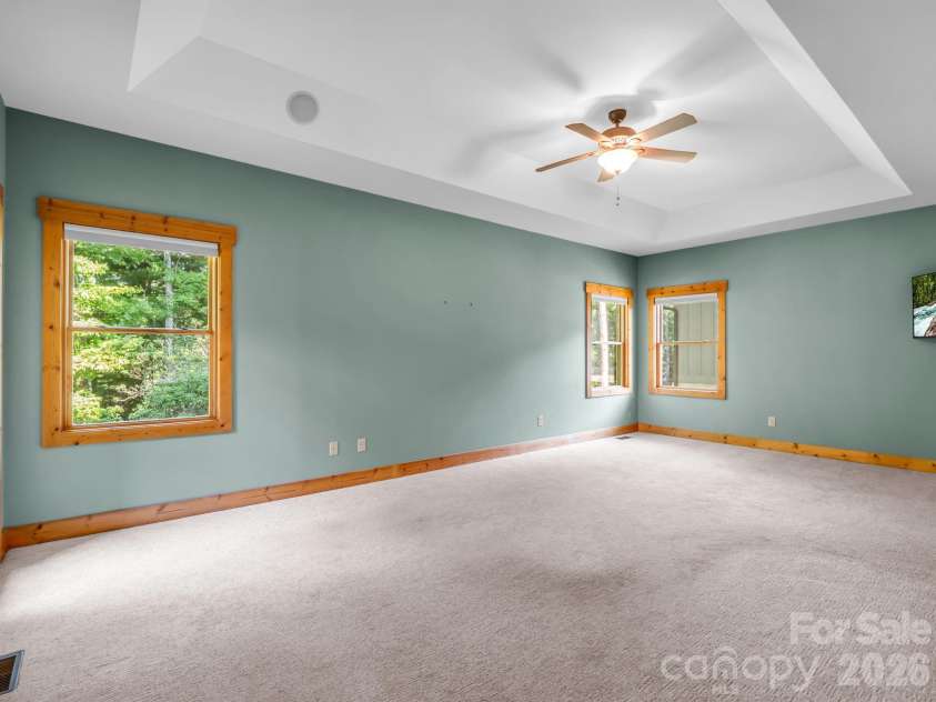 82 Red Mulberry Drive, Zirconia, NC 28790.  MLS# CAR4363684, YatesRealty ID 17694. Primary bedroom