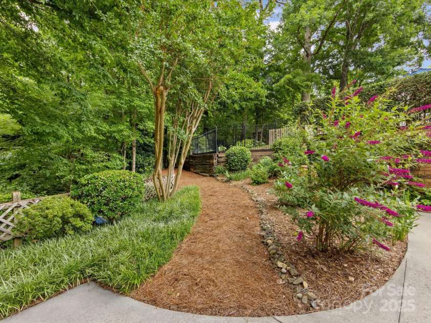 3225 Mill Pond Road, Charlotte, NC 28226.  MLS# CAR4263953, YatesRealty ID 17700. Gorgeous natural grounds
