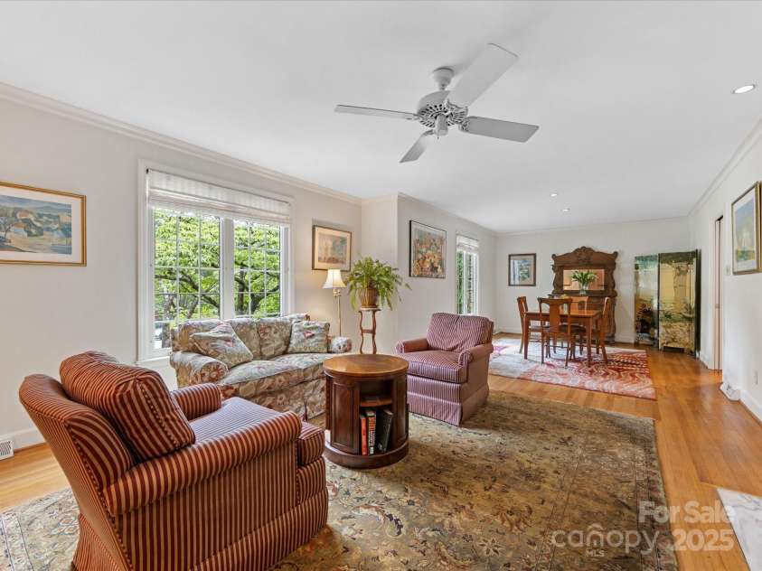 3225 Mill Pond Road, Charlotte, NC 28226.  MLS# CAR4263953, YatesRealty ID 17700. Open living room and dining room