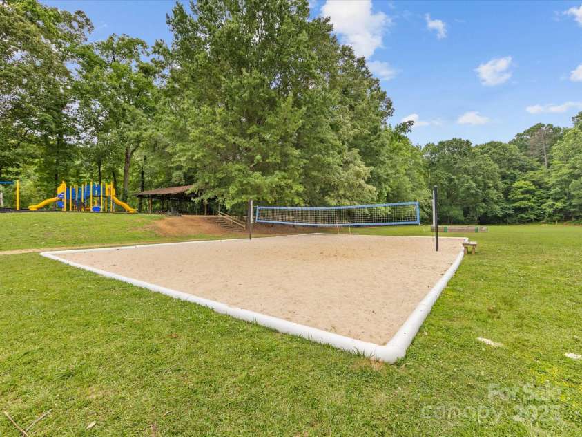 3225 Mill Pond Road, Charlotte, NC 28226.  MLS# CAR4263953, YatesRealty ID 17700. Sand Volleyball at Anne Heinig Park located in the neighborhood