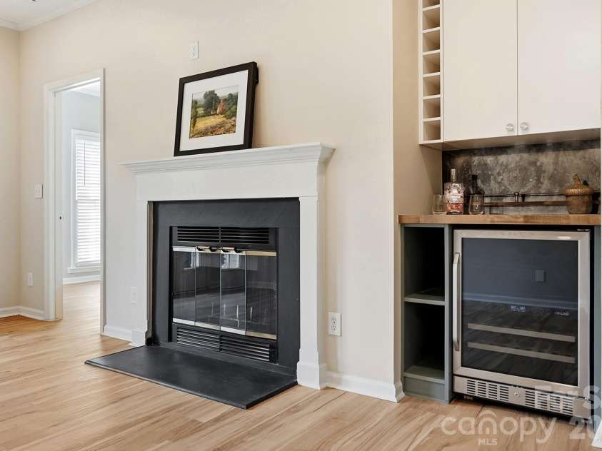 301 Queens Road, Charlotte, NC 28204.  MLS# CAR4420934, YatesRealty ID 17701. Fireplace and beverage station