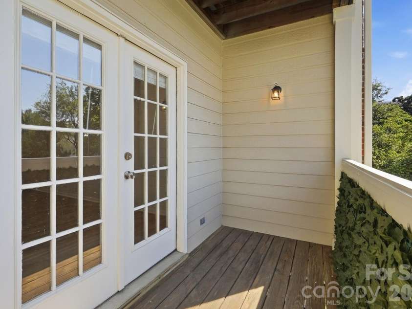 301 Queens Road, Charlotte, NC 28204.  MLS# CAR4420934, YatesRealty ID 17701. French doors to balcony
