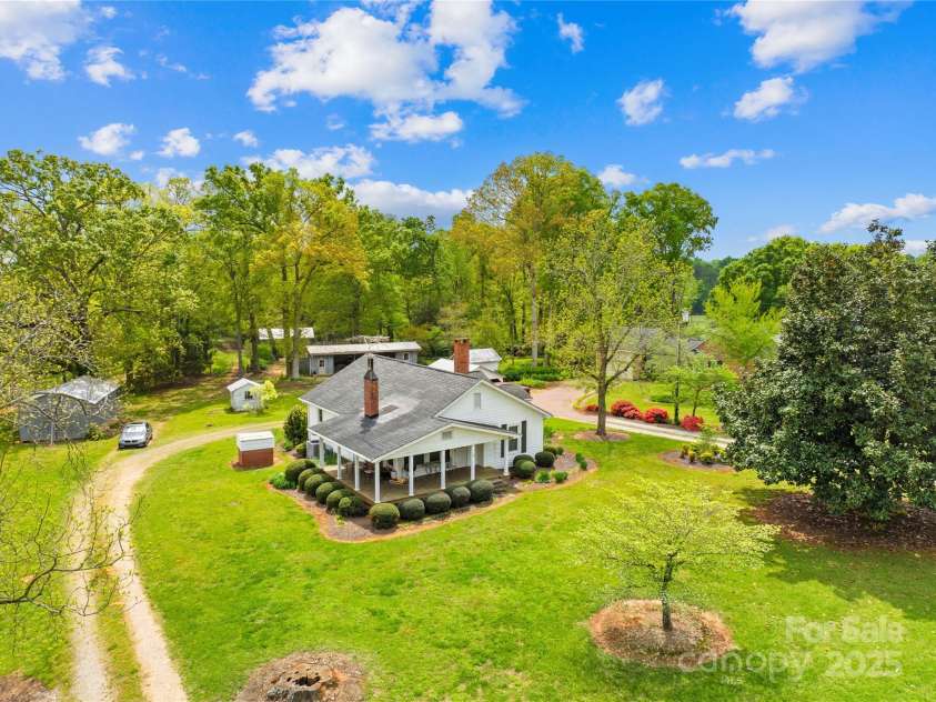 4896 Pageland Highway, Lancaster, SC 29720.  MLS# CAR4246067, YatesRealty ID 17701. White house - 4910 pageland