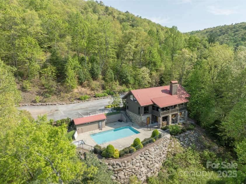 29 Wild Deer Trail, Zirconia, NC 28790.  MLS# CAR4243690, YatesRealty ID 17702. Community clubhouse with outdoor pool