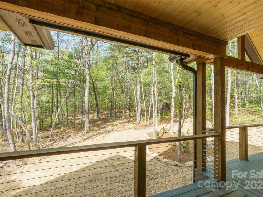 29 Wild Deer Trail, Zirconia, NC 28790.  MLS# CAR4243690, YatesRealty ID 17702. Covered deck in rear