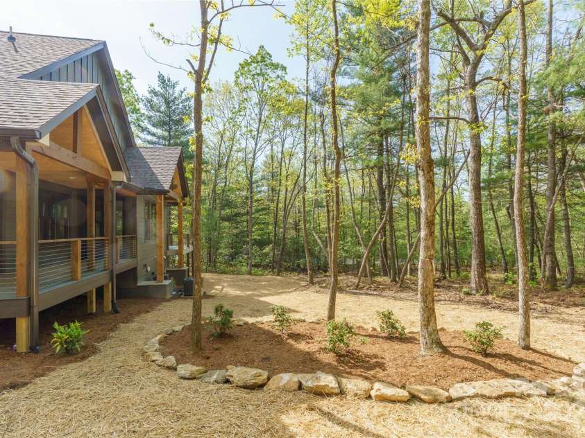 29 Wild Deer Trail, Zirconia, NC 28790.  MLS# CAR4243690, YatesRealty ID 17702. Trees for privacy