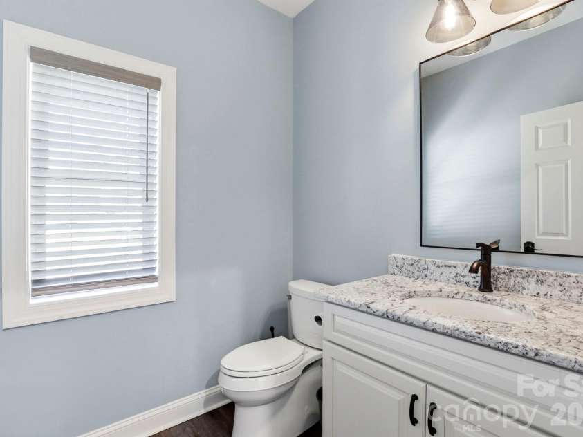 141 Crab Meadow Drive, Hendersonville, NC 28739.  MLS# CAR4373376, YatesRealty ID 17709. Half bath in main level