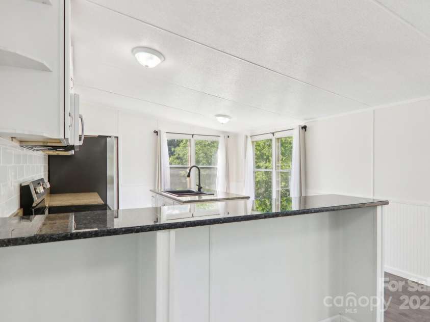 85 Star Flower Road, Alexander, NC 28701.  MLS# CAR4264260, YatesRealty ID 17711. 