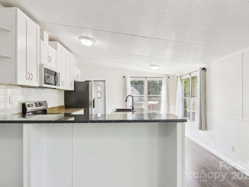 85 Star Flower Road, Alexander, NC 28701.  MLS# CAR4264260, YatesRealty ID 17711. 