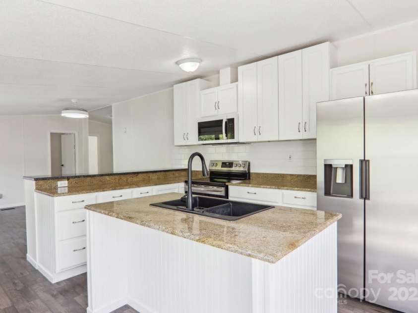 85 Star Flower Road, Alexander, NC 28701.  MLS# CAR4264260, YatesRealty ID 17711. 