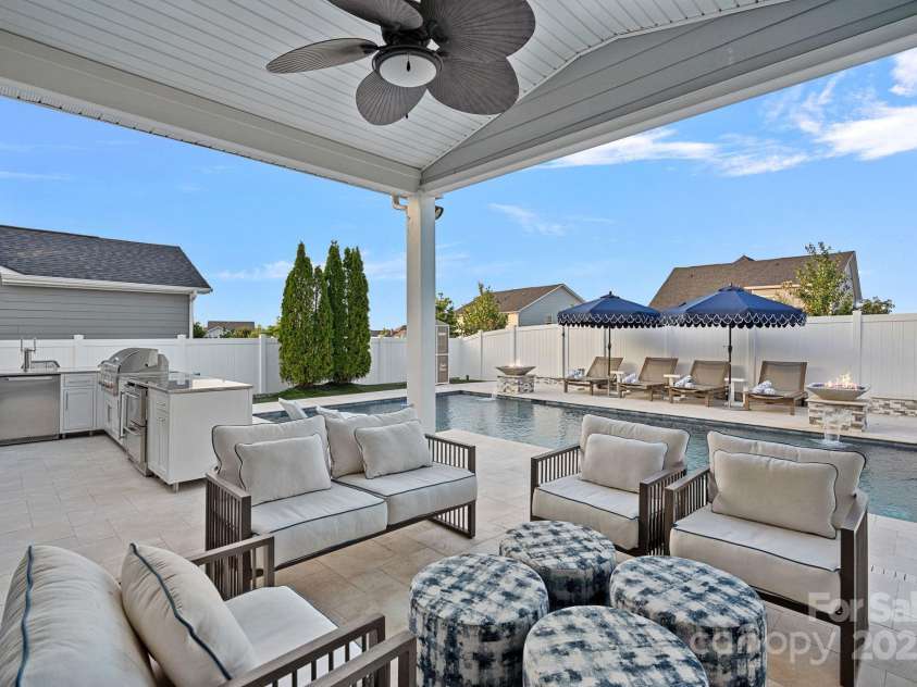 12615 Es Draper Drive, Huntersville, NC 28078.  MLS# CAR4266729, YatesRealty ID 17712. Cover Patio with Fan