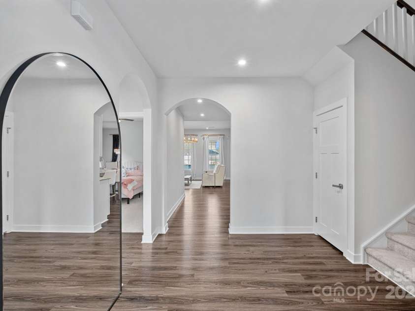 12615 Es Draper Drive, Huntersville, NC 28078.  MLS# CAR4266729, YatesRealty ID 17712. Entry and stairs to Bonus Room