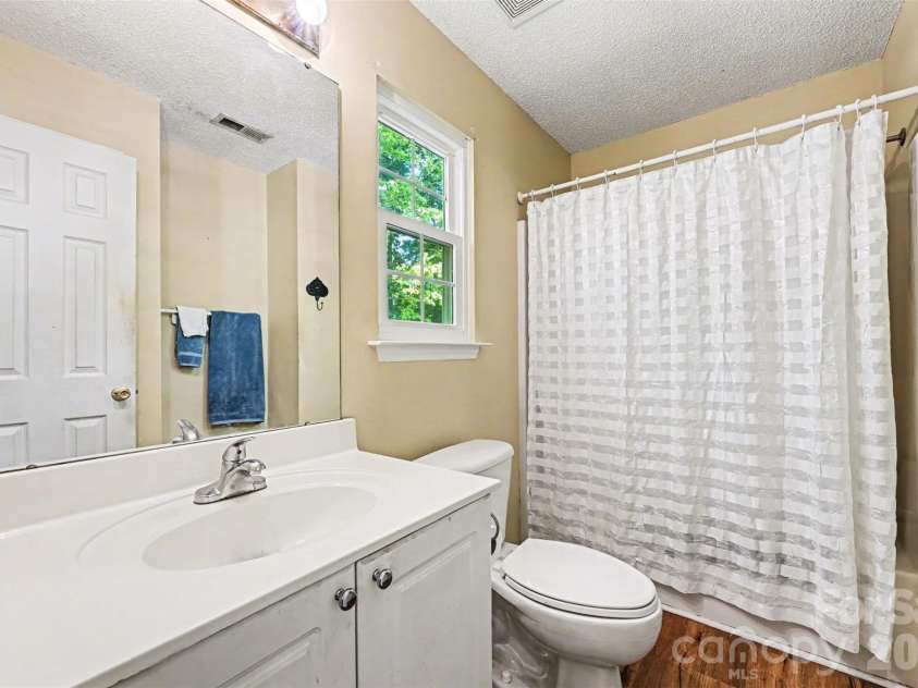4718 Titus Court, Monroe, NC 28110.  MLS# CAR4373667, YatesRealty ID 17713. Primary bathroom