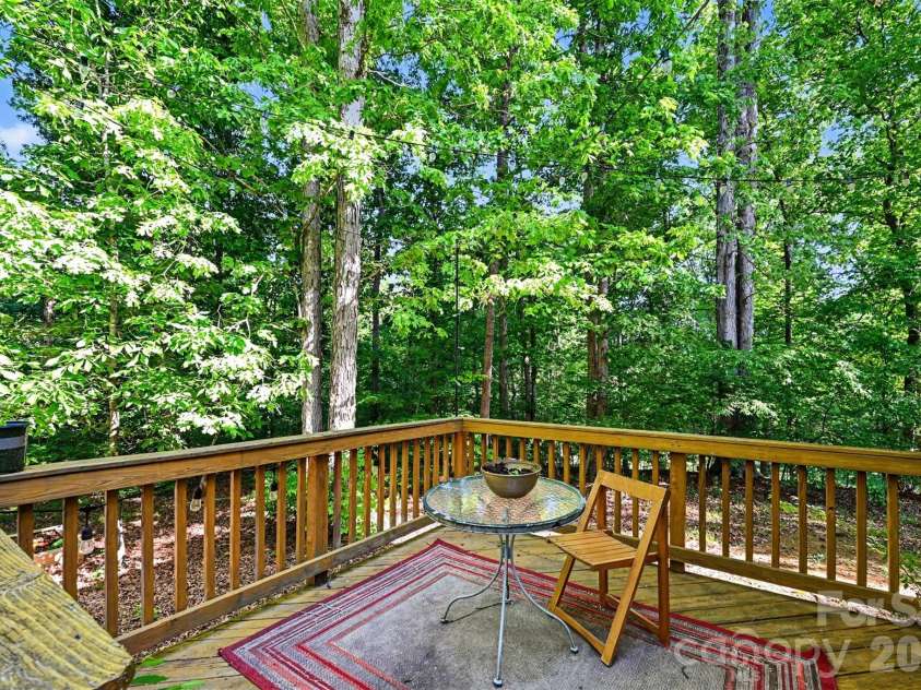 4718 Titus Court, Monroe, NC 28110.  MLS# CAR4373667, YatesRealty ID 17713. Private backyard with wooden deck