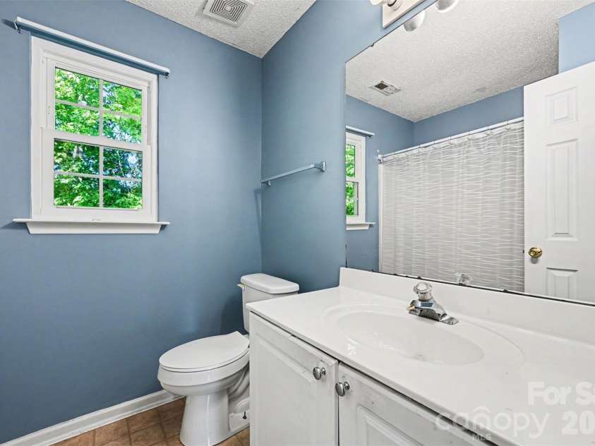 4718 Titus Court, Monroe, NC 28110.  MLS# CAR4373667, YatesRealty ID 17713. Upstairs bathroom